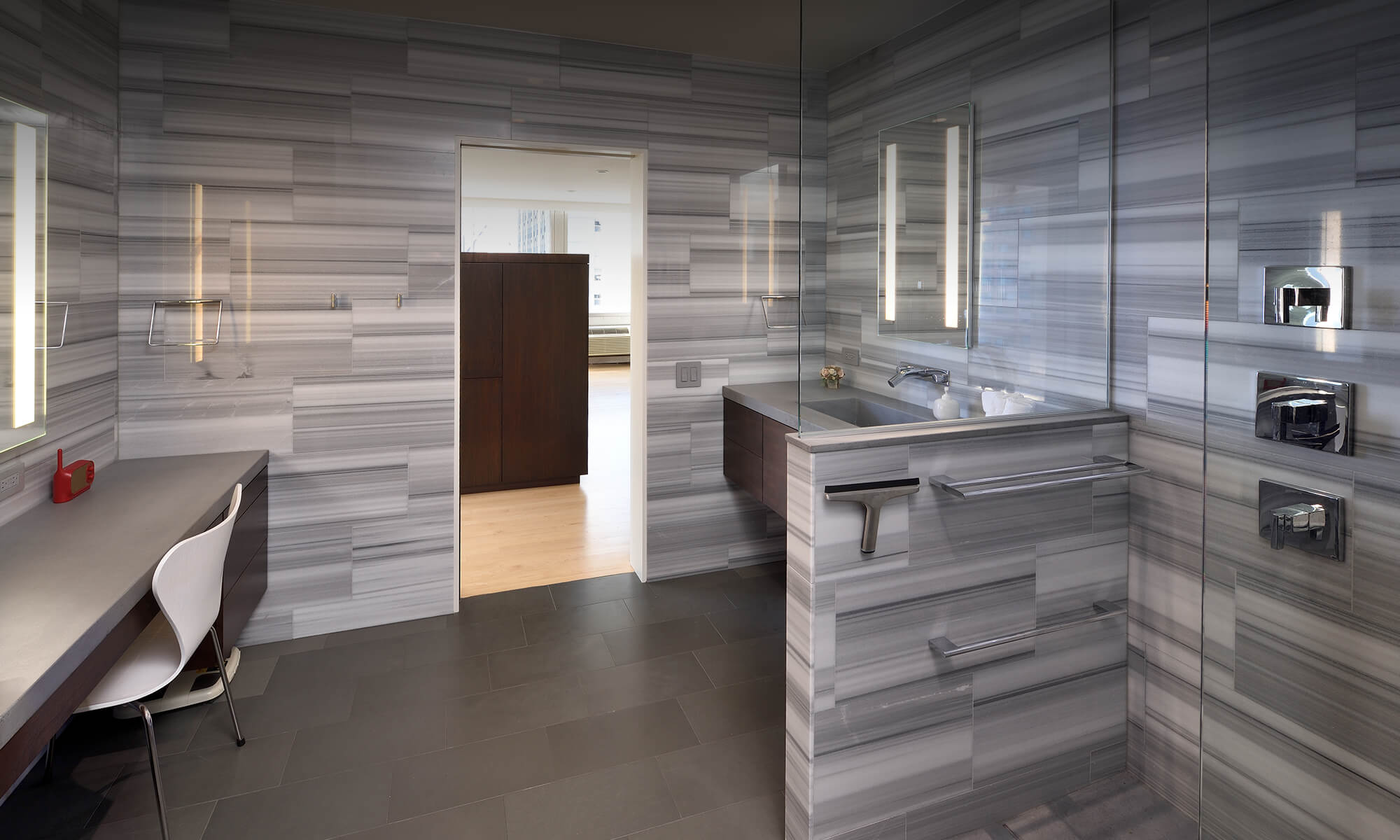 Artistic Construction tiled modern bathroom with walk-in glass shower